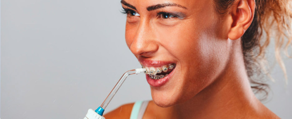 como usar el irrigador dental